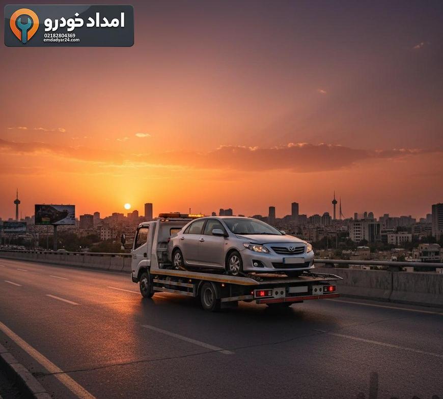 یدک‌کشی تویوتا کرولا 2010 با کفی‌بر در بزرگراه تهران