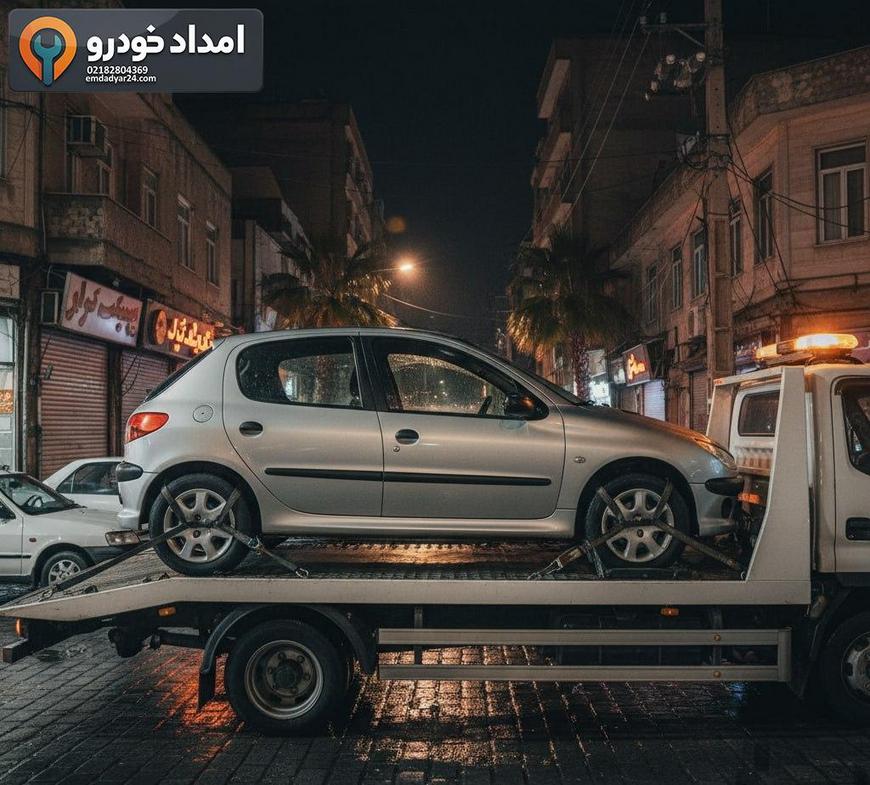 حمل ایمن پژو 206 روی یدک کش کفی با مهار چرخ‌ها